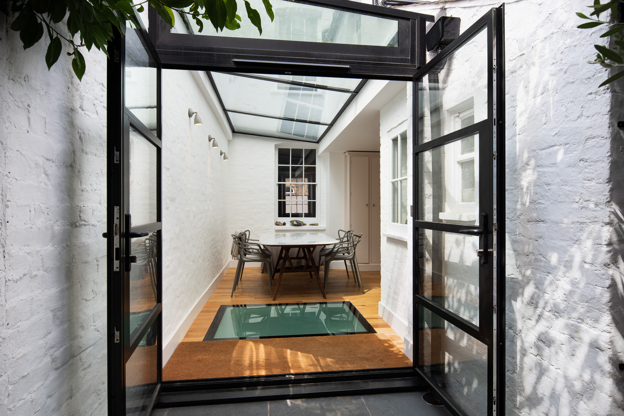 Glazed courtyard dining room at Roupell Street