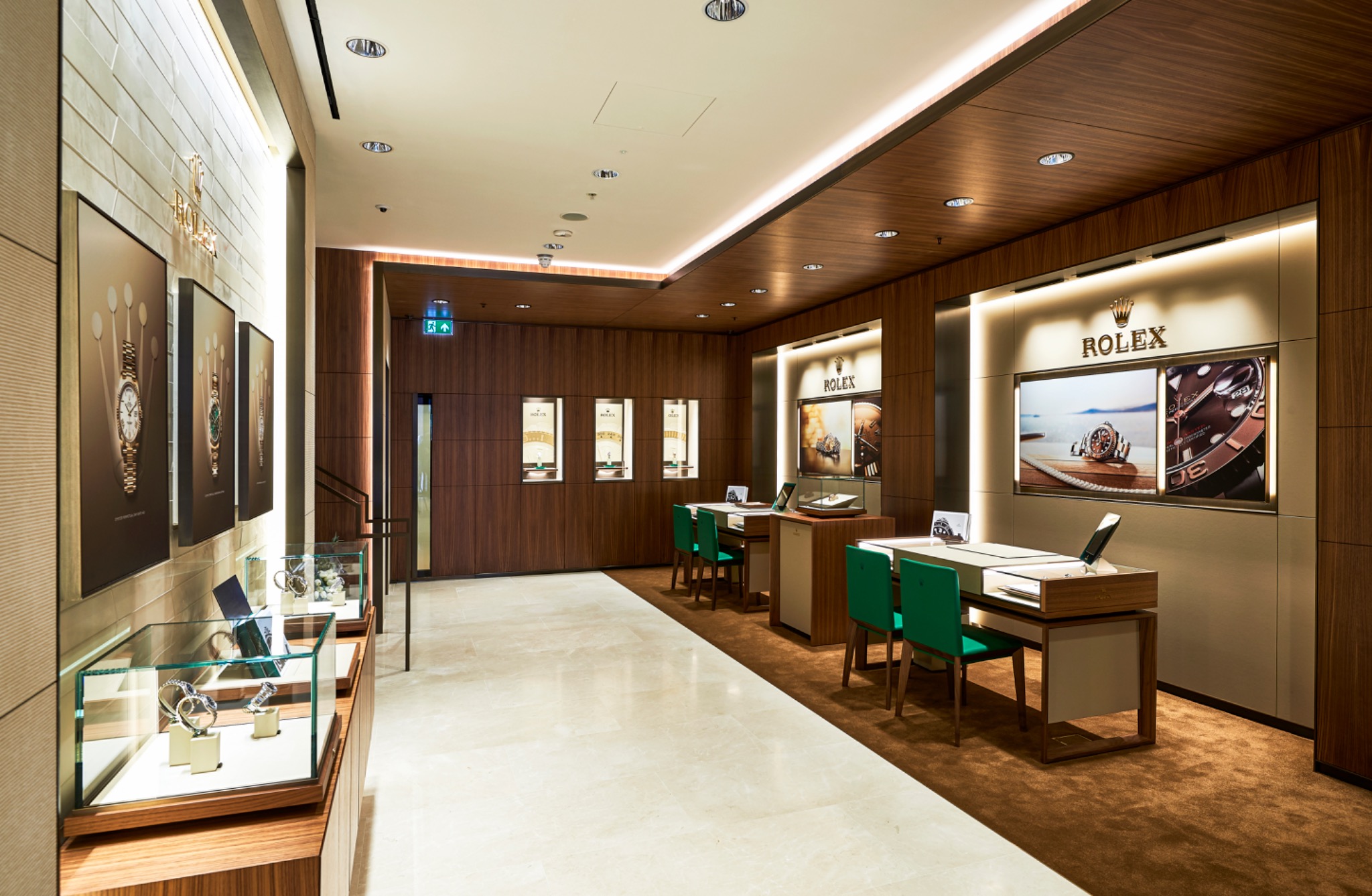 Wide architectural view into a consultation area in the Rolex Glasgow showroom