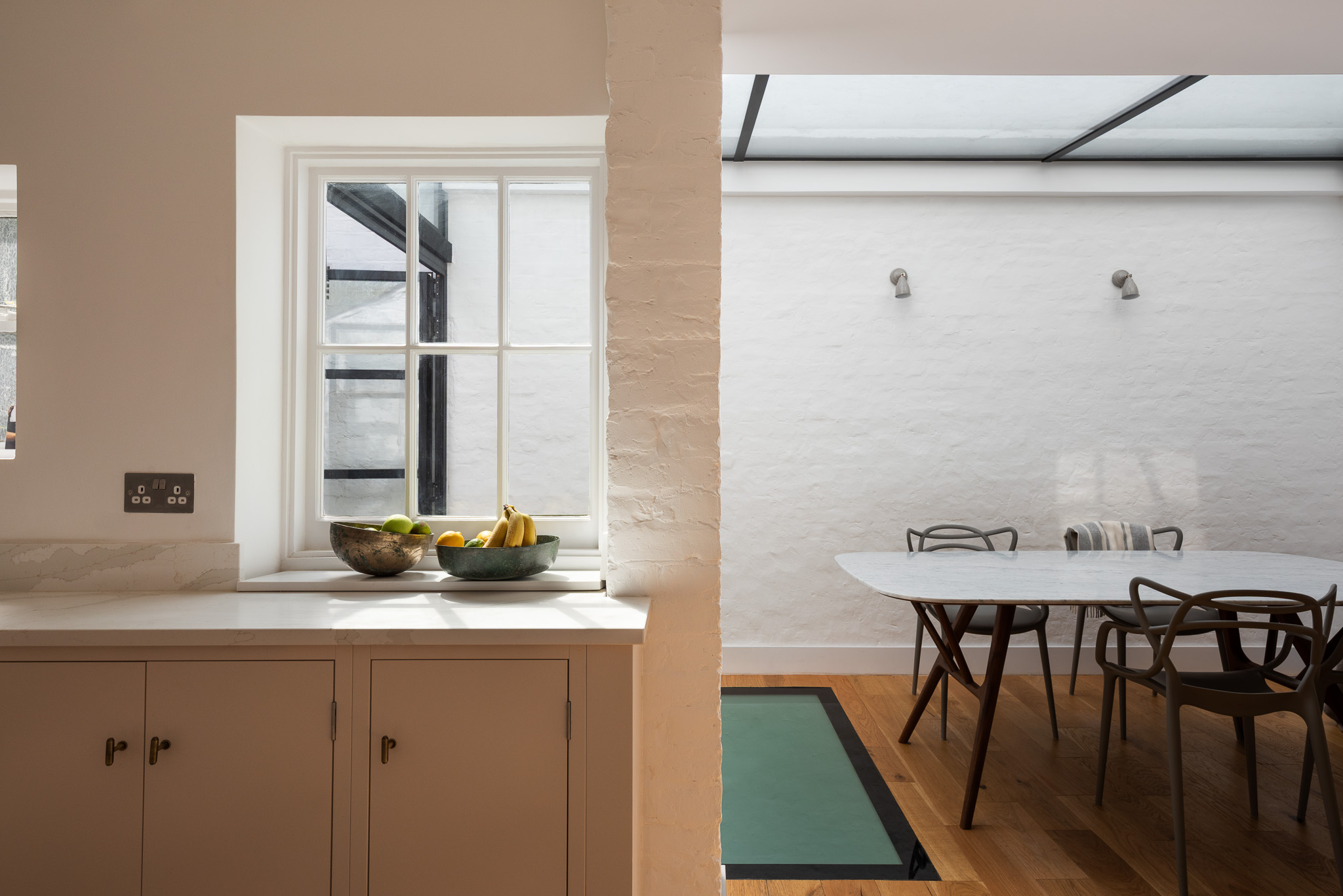 View from the kitchen across the dining area and glazed roof at Roupell Street, London