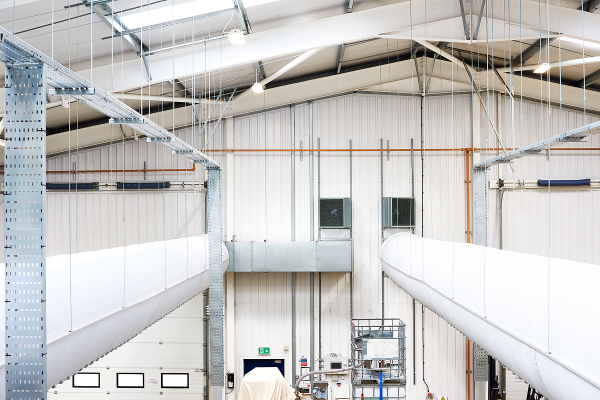 Large air-distribution ducts crossing the factory interior