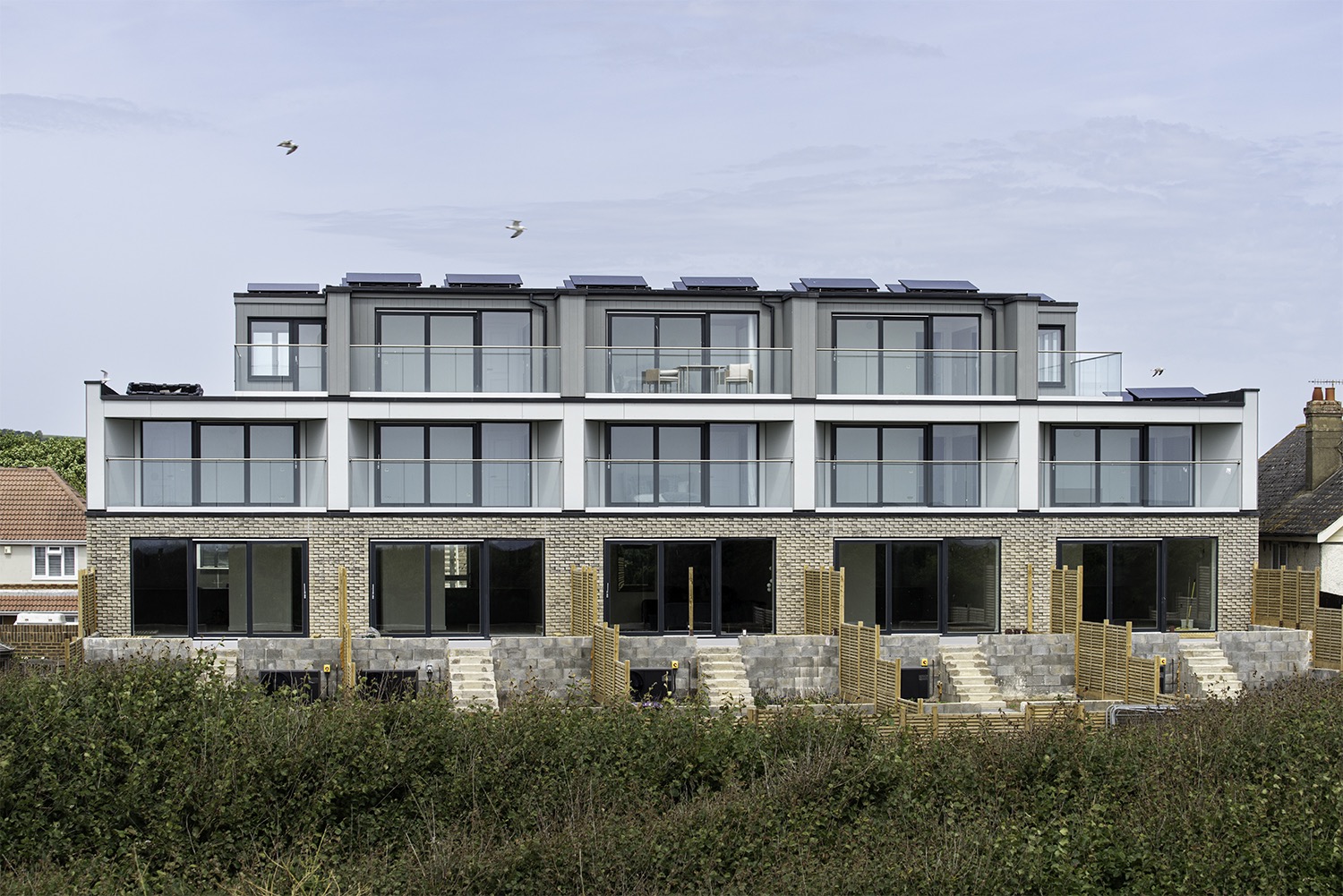 Beachfront residential development, before retouching